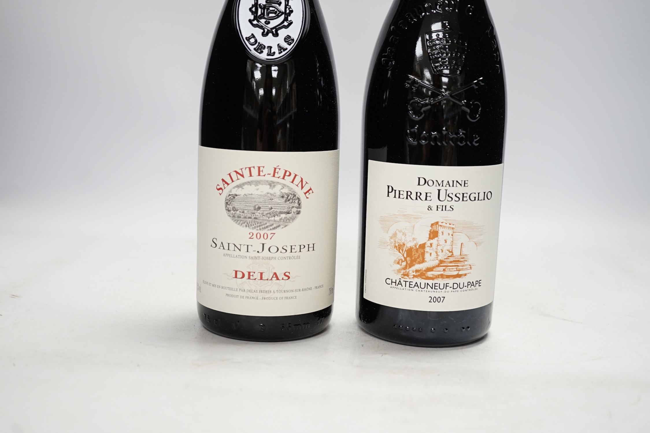Twelve bottles of wine to include six bottles of Domaine Pierre Usseglio & Fils Châteauneuf du Pape 2007, and six bottles of Sainte-Epinephrine Saint-Joseph 2007. Condition - good, storage history unknown.